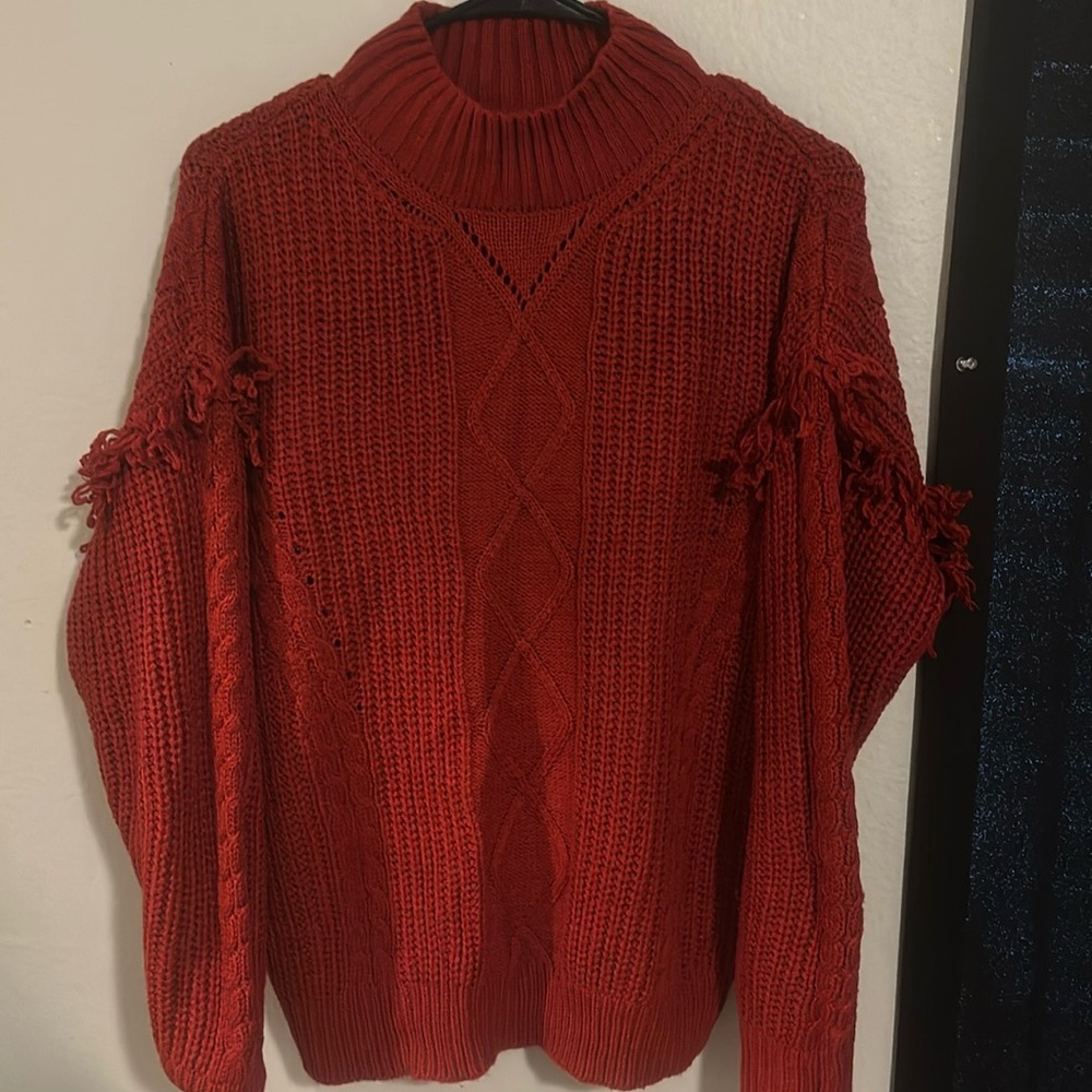 Barely used red woman’s sweater from Macy’s size M.